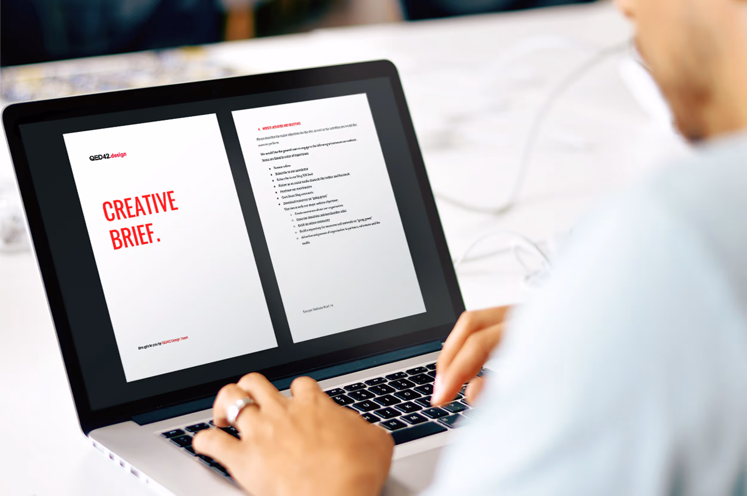 A picture of a person creating the creative brief on the laptop