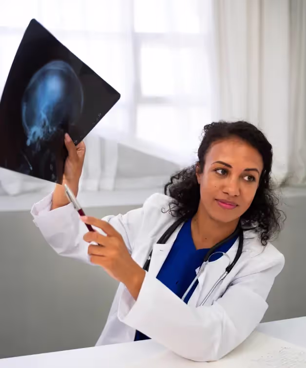 Doctor looking into x-ray