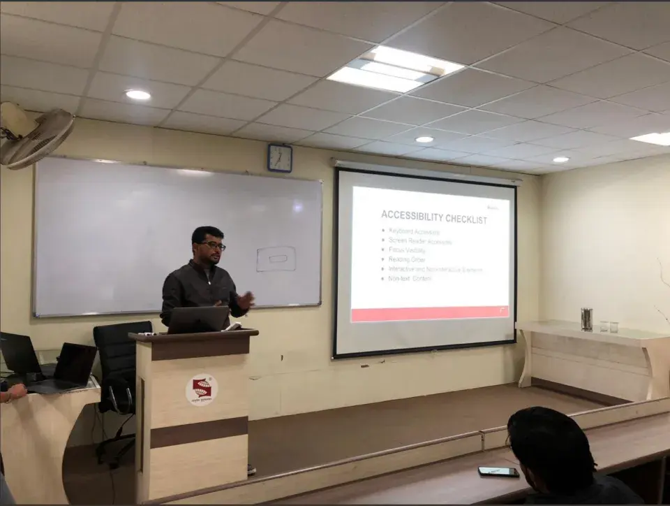 Ambuj explaining QA's perspective on accessibility